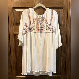 Small white boho dress. Rayon underneath, colored stitching